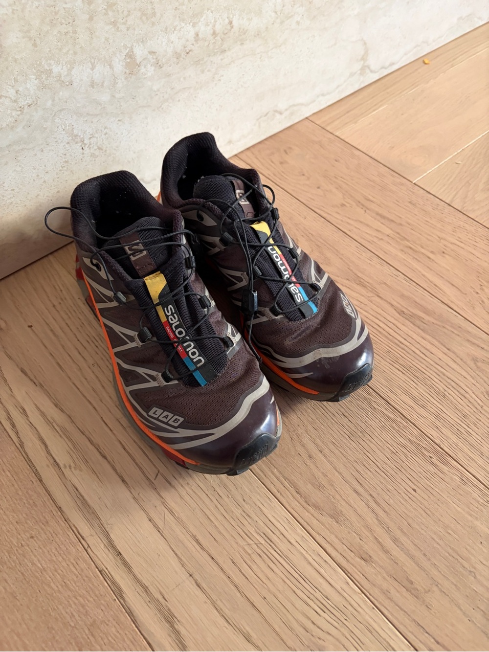 Salomon Women’s Brown Trail Running Shoes with Orange Accents
